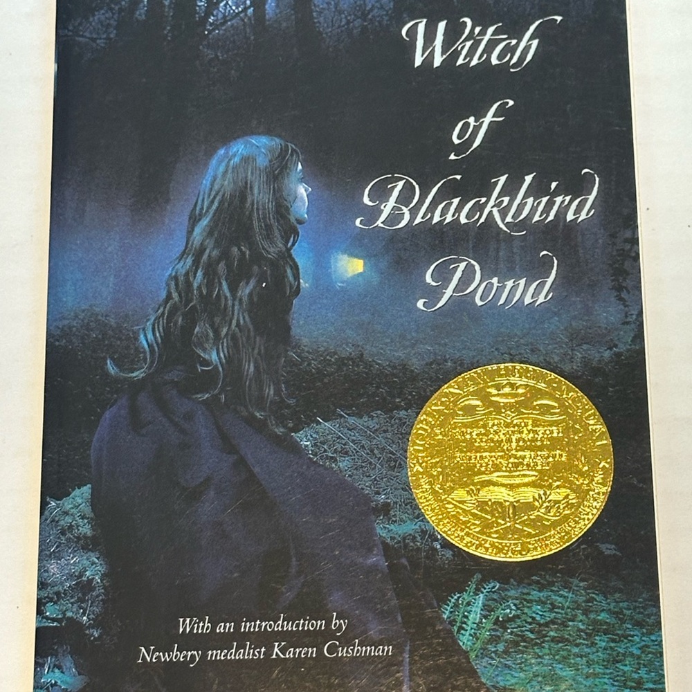Witch of Blackbird Pond Book - Dark Blue Cover with Gold Seal